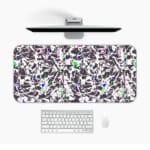 Infidu Vector Pattern Desk Pad with chaotic black and white design, colorful accents, and a white background. Desk Pad on the computer table