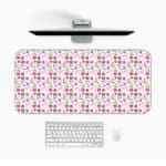 White desk mat with a small, densely packed floral pattern featuring pink, purple, and yellow flowers for a unique desk touch. Desk Pad Design Kept on a computer table