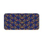 Dark blue desk mat with a dense pattern of small orange and yellow flowers and green leaves, adding vibrant charm to your workspace. Desk Pad kept on a plain white background