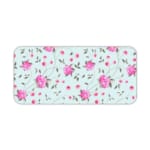 Light mint green desk mat with large pink roses and green leaves, offering a unique and charming touch to your workspace. Desk Pad kept on a plain white background