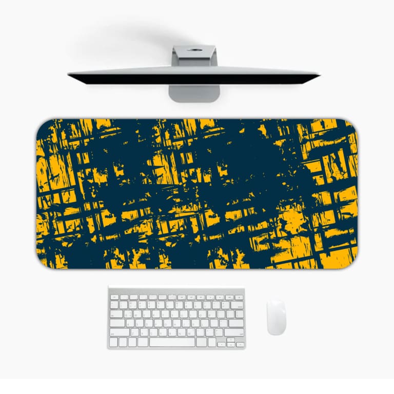 Infidu Vector Pattern Desk Pad with yellow grid-like lines on a deep teal background, ideal for modern workspaces. Desk Mat with a laptop