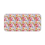 Light pink desk mat with a vibrant floral pattern featuring pink, red, and yellow flowers and blue leaves for a creative workspace touch. Desk Pad kept on a plain white background