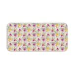 White desk mat with a medium-sized floral pattern in pink, yellow, and purple flowers, adding a vibrant and creative touch to your desk. Desk Pad kept on a plain white background