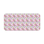 White desk mat with a small, densely packed floral pattern featuring pink, purple, and yellow flowers for a unique desk touch. Desk Pad kept on a plain white background