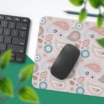 Infidu Boho Pattern Desk Mat with light pink background and paisley pattern in darker pink and blue circular designs. Desk Pad with Keyboard and Mouse