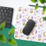 Infidu Boho Pattern Desk Mat with white background and pastel pink and purple dreamcatchers, feathers, and leaf shapes. Desk Pad with Keyboard and Mouse