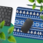 Infidu Knitted Pattern Desk Pad with white background and dark blue snowflakes and geometric shapes. Desk Pad with Keyboard and Mouse