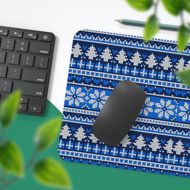 Infidu Knitted Pattern Desk Pad with white background and dark blue snowflakes and geometric shapes. Desk Pad with Keyboard and Mouse