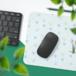 Infidu Just Born Chick Desk Mat with a white background and gray triangle design in a comic-style. Desk Pad with Keyboard and Mouse