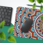 Infidu Desk Pad featuring intricate mandala design with blue background and vibrant orange, red, and white details. Desk Pad with Keyboard and Mouse