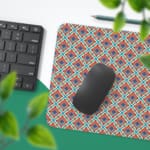 Infidu Desk Pad has a vibrant geometric diamond pattern and a colorful red, blue, and white background. Desk Pad with Keyboard and Mouse