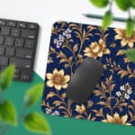 Navy blue desk mat with a golden floral pattern featuring stylized flowers and stems, adding elegance to your workspace. Desk Pad with Keyboard and Mouse