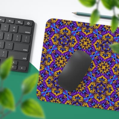 Infidu desk pad featuring a deep purple background with repeating yellow floral and star-like patterns. Desk Pad with Keyboard and Mouse