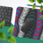 Infidu Vector Pattern Desk Pad featuring wavy lines in gray, red, and teal on a dark gray or black background. Desk Pad with Keyboard and Mouse