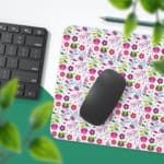 White desk mat with a small, densely packed floral pattern featuring pink, purple, and yellow flowers for a unique desk touch. Desk Pad with Keyboard and Mouse