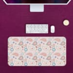 Infidu Boho Pattern Desk Mat with light pink background and paisley pattern in darker pink and blue circular designs. Desk Pad with Keyboard and Mouse in pink background