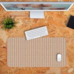 Infidu Geometric Pattern Art Desk Pad featuring small orange diamonds on a light blue background for a retro and modern look. Desk Pad kept on a orange background