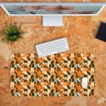 Infidu Geometric Pattern Art Desk Pad with abstract geometric design in orange, black, and white for a modern and dynamic workspace. Desk Pad with Keyboard and Mouse in orange background