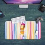 Infidu Crayon Cartoon Desk Mat with colorful vertical stripes and a cheerful cartoon pencil character, adding a creative touch to your desk. Desk Pad with Keyboard and Mouse in green background