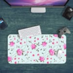 Light mint green desk mat with large pink roses and green leaves, offering a unique and charming touch to your workspace. Desk Pad on the computer table