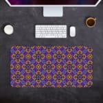 Infidu desk pad featuring a deep purple background with repeating yellow floral and star-like patterns. Desk Pad with Keyboard and Mouse in gray background