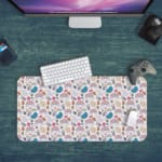 Infidu Boho Pattern Desk Mat with colorful cups, plants, and geometric shapes on a white background, adding a stylish and functional touch. Desk Pad kept on a green background