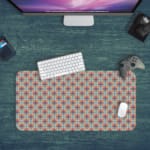 Infidu Desk Pad has a vibrant geometric diamond pattern and a colorful red, blue, and white background. Design Kept on a computer table