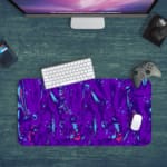 Infidu Vector Pattern Desk Pad with a swirling fluid pattern in purple and light blue on a deep purple background. Desk Pad kept on a green background