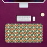 Infidu Geometric Pattern Art Desk Pad with a retro diamond-shaped pattern in orange and teal for a stylish and symmetrical workspace. Desk Pad kept on a plain white background