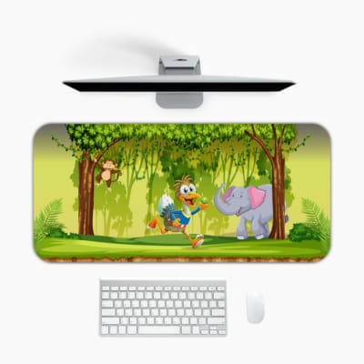 Infidu Explore Nature Desk Mat features a colorful forest scene with a bird, elephant, monkey, and a lively green and brown background. Desk Mat with an Apple Computer