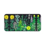 Black desk mat with colorful flower and plant illustrations, including yellow daisies and green plants, featuring a unique design. Desk Pad kept on a plain white background