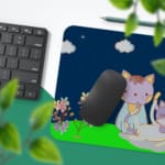 Infidu Bring Cat Magic Desk Mat featuring anime cats with a navy blue sky, clouds, and floral designs. Perfect for adding charm to any desk. Desk Pad with Keyboard and Mouse