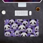 Infidu Bring Panda Playfulness Desk Mat featuring black and white pandas on a violet background, designed uniquely by our digital artists. Desk Pad kept on a plain gray background