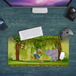 Infidu Explore Nature Desk Mat features a colorful forest scene with a bird, elephant, monkey, and a lively green and brown background. Desk Pad kept on a plain blue background