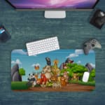 Infidu Explore Nature Desk Mat features a vibrant anime design with animals, trees, and mountains in orange and other colors, perfect for children's desks Desk Pad kept on a plain blue background