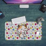 Infidu Bring Cat Magic Desk Pad featuring a whimsical anime-inspired cat design in yellow and blue, perfect for adding a touch of magic to your workspace Desk Pad with Kept on a computer table