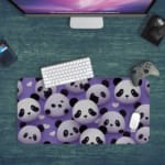 Infidu Bring Panda Playfulness Desk Mat featuring black and white pandas on a violet background, designed uniquely by our digital artists. Desk Pad kept on a plain blue background