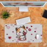 Infidu Bring Cat Magic to Your Desk Mat features a whimsical anime cat design with hearts and flowers on a white and red background Desk Pad kept on a plain orange background