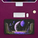 Infidu Space Desk Pad features an abstract alien landscape with geometric rock formations and multiple planets against a black space background. Desk Pad with Keyboard and Mouse