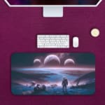 Infidu Space Desk Pad shows a person on a cliff overlooking an alien planet with multiple moons, set against a dark black space background. Desk Pad kept on a pink background