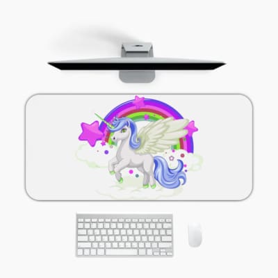 Unicorn Desk Mat with white background, rainbow, and purple stars, and a unicorn with a greenhorn surrounded by clouds. Desk Pad on the computer table