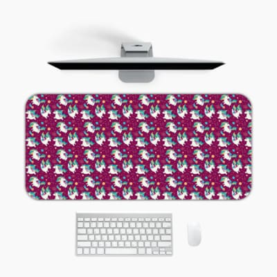 Unicorn Desk Mat with a colorful forest scene, purple, pink, and blue background, stars, clouds, and a unicorn with a rainbow mane and golden horn. Desk Pad on the computer table