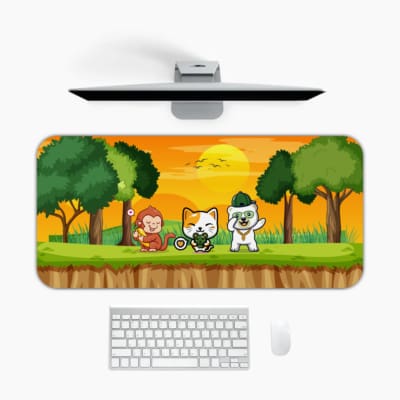 Gaming desk pad with a yellow background featuring a sun, clouds, and playful images of a cat and monkey. Ideal for children’s desks. Design Kept on a computer table