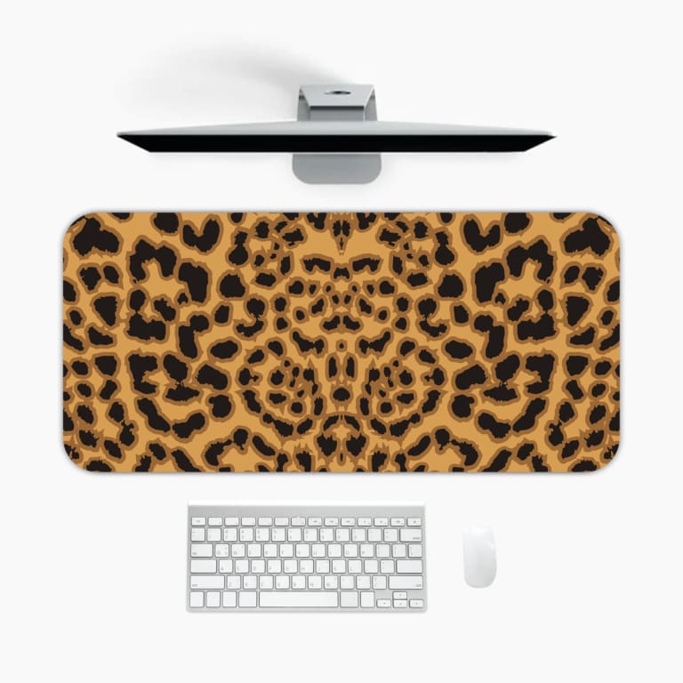 Infidu Light Beige Desk Pad with dark brown leopard print spots. A desk pad under the computer