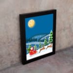 Santa Claus in a red sleigh with reindeer flying through a snowy winter landscape under a full moon. displayed on the wall in black frame