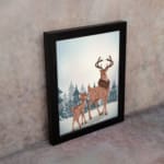 Winter-themed wall art with a reddish-brown deer, blue trees, and a light, snowy background in a watercolor style. on the wall in a black frame