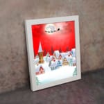 Santa Claus flying in a sleigh with reindeer against a red background, full moon, and snowy village. displayed on the wall in a white frame