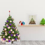 Christmas tree illustration with white ornaments, light gray background, snowflakes, and a dark frame. displayed on the table in a white frame