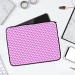 Light purple laptop sleeve with white triangle pattern, designed for a modern and minimalist look. laptop sleeve kept on a plain white background