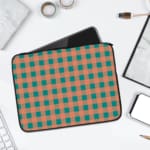 Infidu checkered beige and green laptop sleeve with a modern and colorful pattern. laptop sleeve kept on a plain white background